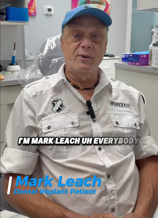 HOME 12 MARK LEACH, DENTAL IMPLANT PATIENT, SEATED AT RUDNICK DENTISTRY